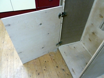 maintenance door at the front, mounted with concealed hinges